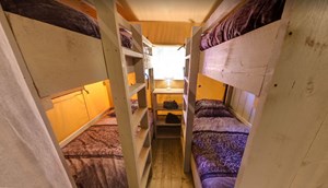 Safaritent with sanitary for groups, bedroom with bunkbeds