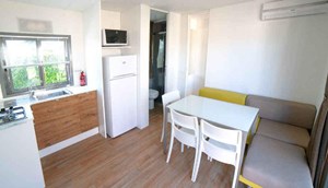 Mobile home Prestige Deluxe airco - cosy dining/sitting area 